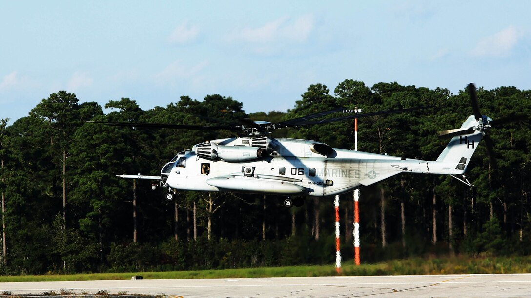 A CH-53E Super Stallion with Marine Heavy Helicopter Squadron 366 takes off at Marine Corps Air Station Cherry Point, N.C., to take part in aerial refueling training off the coast of North Carolina Oct. 8, 2014.
