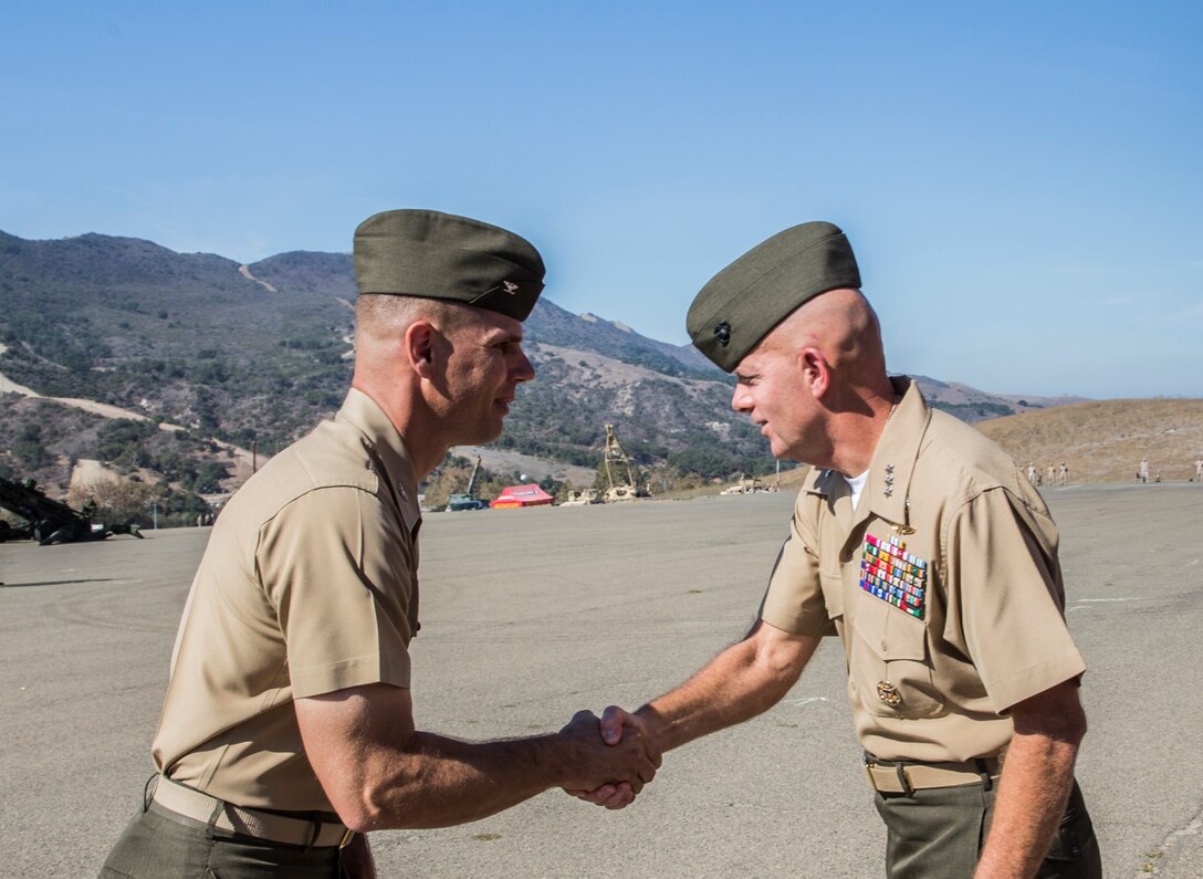 U.S. Marine Col. Vance L. Cryer, left, greets Lt. Gen. David H. Berger after the composite ceremony for the 15th Marine Expeditionary Unit aboard Camp Pendleton, Calif., Oct. 10, 2014. Cryer is the commanding officer of the 15th Marine Expeditionary Unit. Berger is the commanding general of I Marine Expeditionary Force. (U.S. Marine Corps photo by Sgt. Emmanuel Ramos/Released)