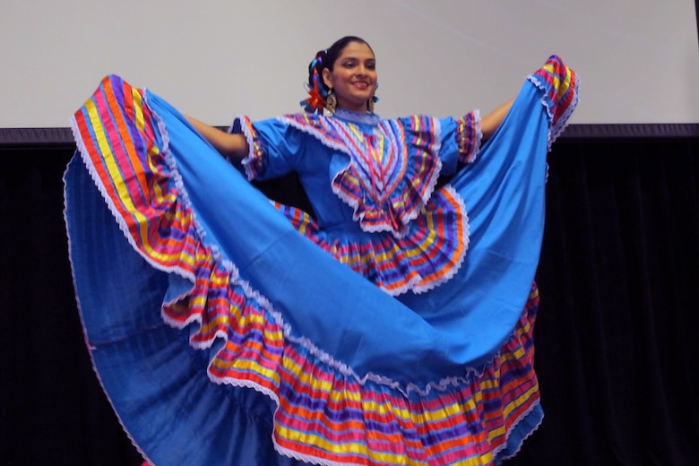 Iylene Patino performs cultural dance during Hispanic Heritage Month Program.