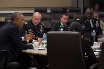 U.S. President Barack Obama meets with military leaders from 22 nations to discuss strategy in the Middle East at Joint Base Andrews, Md., Oct 14, 2014. The discussion was part of a ongoing effort to build a coalition and integrate capabilities of each country.