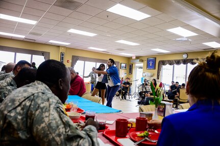 Performers from the Dilcia Mejia Dance School entertain the members of Joint Task Force-Bravo during Hispanic Heritage Month celebration at the dining facility on Soto Cano Air Base, Honduras, Oct. 9, 2014.  In celebration of Hispanic Heritage Month, JTF-B coordinated performances from the Honduran Navy Band stationed in Tegucigalpa,  the official folk dance group from the Escuela Normal Centro América, as well as a couple of performers  from the Dilcia Mejia Dance School. (U.S. Air Force Photo by Tech. Sgt. Heather Redman/Released)