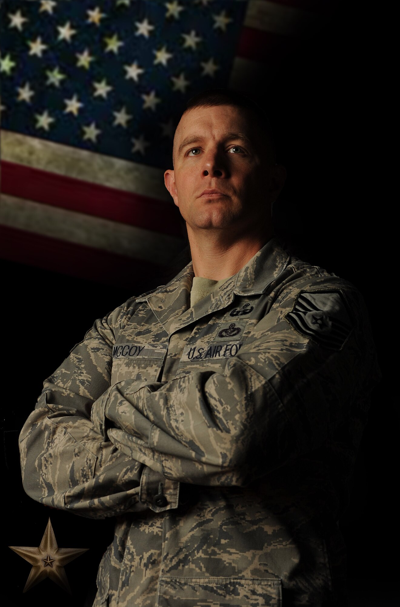 Master Sgt. John McCoy, 5th Bomb Wing Explosive Ordinance Disposal flight chief, poses for a photo on Minot Air Force Base, N.D., Oct. 10, 2014. McCoy is a member of the last six Air Force EOD flights to come home and is a three-time bronze star recipient. (U.S. Air Force graphic/Master Sgt. Charlene Spade)