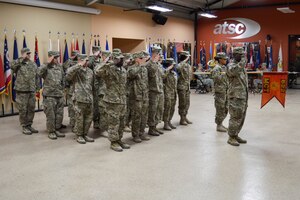 U.S. Army Soldiers assigned to the 622nd Movement Control Team, 53rd Transportation Battalion, 7th Transportation Brigade (Expeditionary), stand in formation during a re-deployment ceremony at Fort Eustis, Va., Oct. 8, 2014. The 20-person team was responsible for processing transportation movement releases, convoy clearance and entry point operations while deployed to Afghanistan in support of Operation Enduring Freedom. (U.S. Army photo by Spc. Marian Alleva/Released)