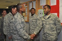 Gen. Darren McDew, Air Mobility Command commander, greets Airman 1st Class Quinton McKinney, 916th Aircraft Maintenance Squadron, during his visit to Seymour Johnson Air Force Base, Sept. 23, 2014. McDew visited to meet the Airmen of the 916th ARW and its Total Force Associate partner, the 911th Air Refueling Squadron. (USAF photo by Staff Sgt. Alan Abernethy, 916ARW/PA) 