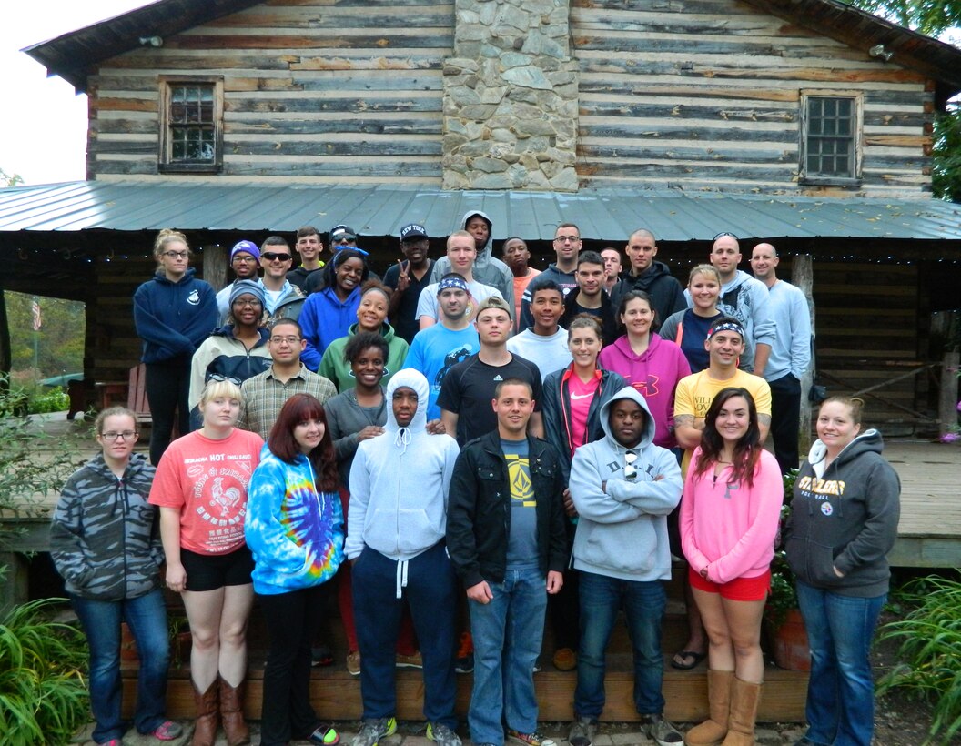 Airmen pose for a photo at Wilderness Adventure at Eagle Landing in New Castle, Va., Oct. 2, 2014. They spent five days in the outdoors with an end goal of building teamwork, confidence and a resilient community. (Courtesy photo)