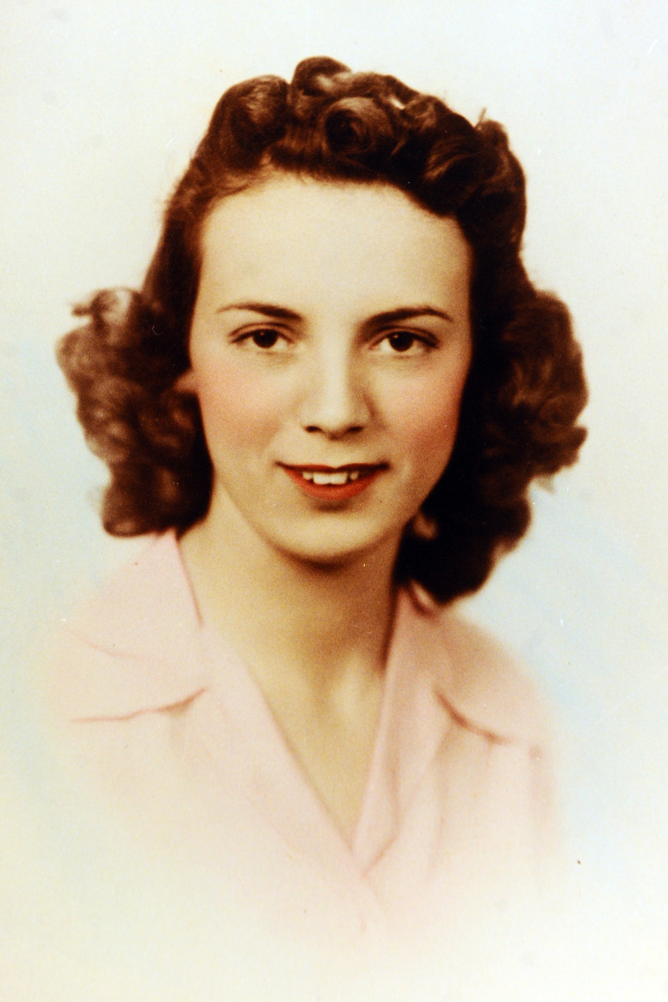Portrait of Kathryn Narmi Shudak in the early 1940s when she was employed at the Glenn L. Martin-Nebraska Bomber Plant to drive rivets into B-29 Bombers in support of the war effort.  Shudak worked at the plant from 1942 to 1945 as one of many Rosie the Riveters.  (U.S. Air Force photo by Josh Plueger/Released)