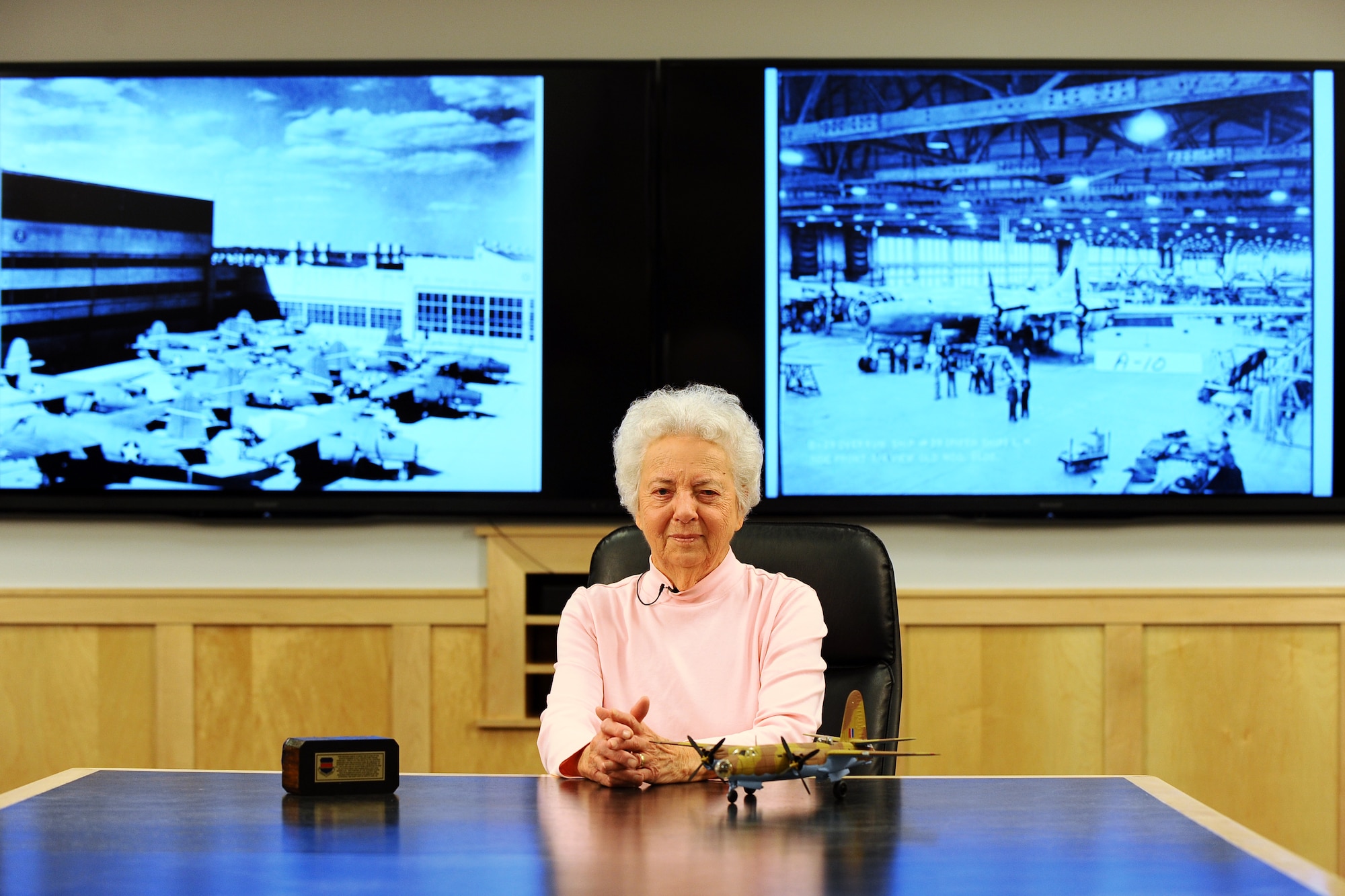 Kathryn Shudak sits for a portrait inside the 55th Civil Engineer’s conference room, which is located in the Glenn L. Martin Bomber building. Shudak, one of the Rosie the Riveters of WWII, spent three years riveting B-29 Bombers as they made their way down the assembly line.  (U.S. Air Force photo by Josh Plueger/Released)