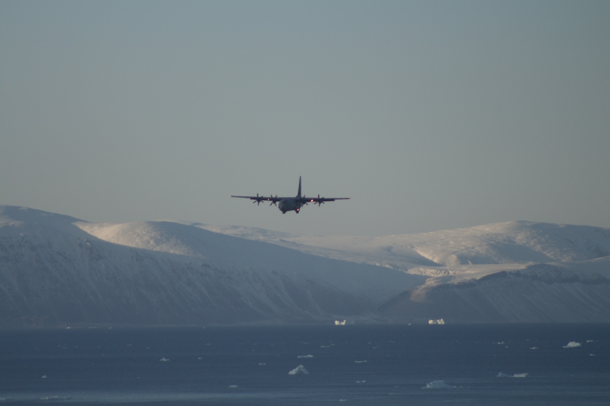 THULE AIR BASE, Greenland – A Royal Canadian Air Force C-130 Hercules comes in on final approach to Thule during Operation Boxtop Sept. 30. The aircraft carried cargo to resupply Canadian Forces Station Alert and Eureka Research Station during the bi-annual operation mission. (U.S. Air Force photo/Tech. Sgt. Jason Brumbaugh)