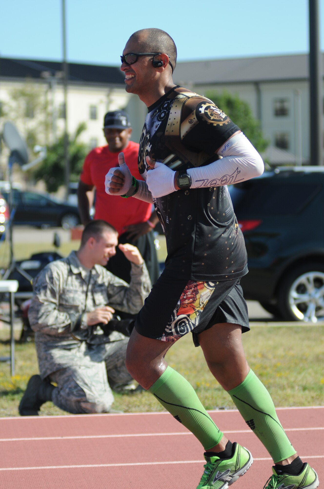 Tech. Sgt. Guadalupe Galindo, Jr., 335th Training Squadron, runs around the Triangle Track during the 5th annual Dragon Challenge Oct. 10, 2014, Keesler Air Force Base, Miss.  The purpose of the event was to raise funds for the Keesler Fisher House.  (U.S. Air Force photo by Kemberly Groue)