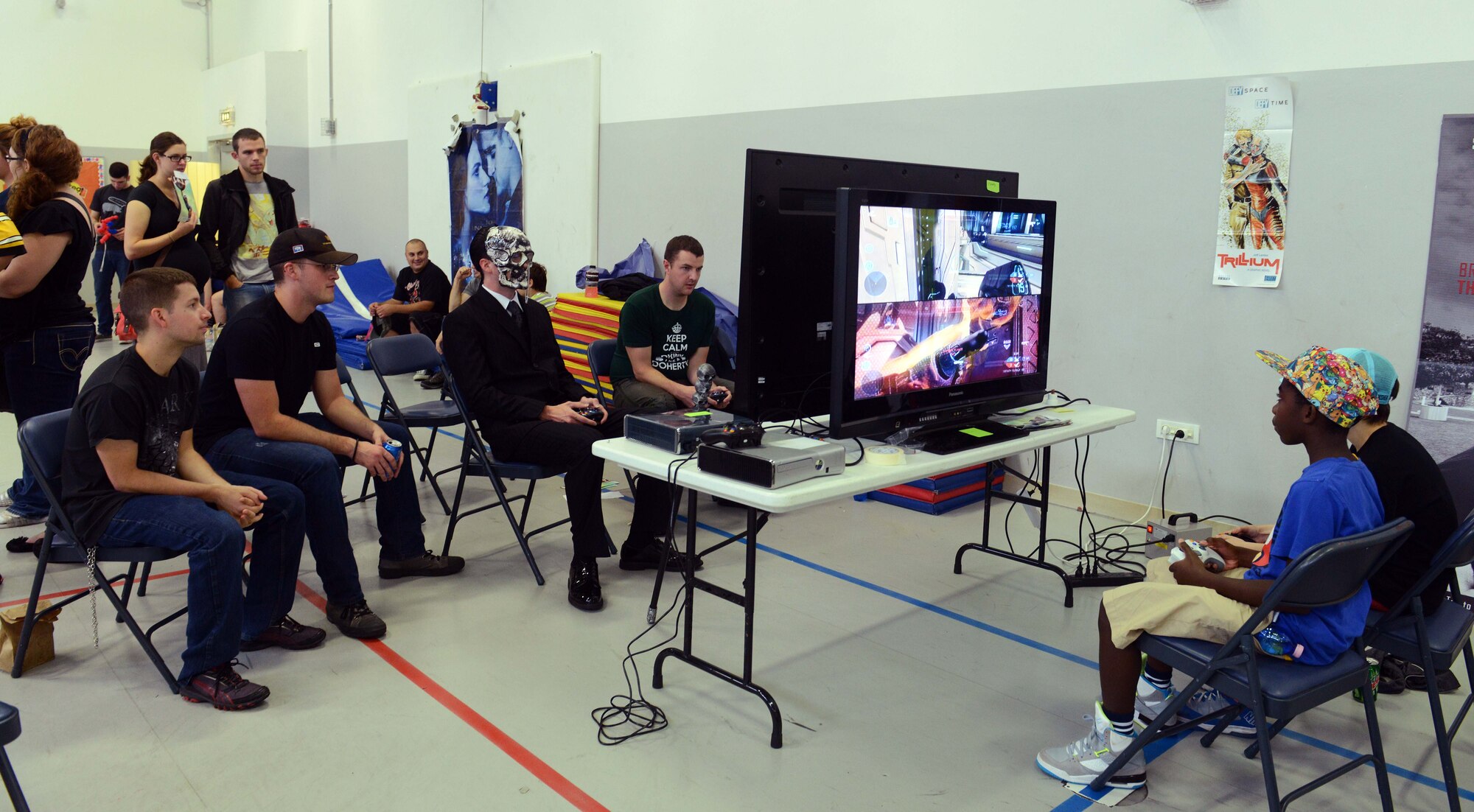 Players compete in video game tournaments during the first “AviCon” hosted by Aviano’s Wing Diversity Council, Oct. 11, 2014, at Aviano Air Base, Italy. Gamers played Super Smash Brothers Brawl, Halo 4 and Ultimate Marvel VS Capcom 3 for prizes throughout the event. AviCon is a play-off of the original Comic Con International hosted in San Diego. (U.S. Air Force photo/Airman 1st Class Deana Heitzman)