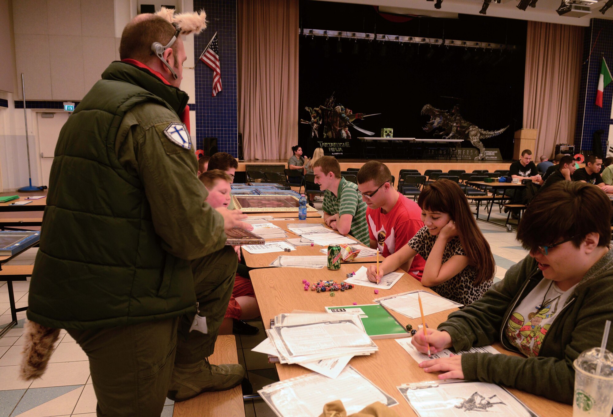 Participants create characters before a game of Dungeons and Dragons at the first “AviCon,” Oct. 11, 2014, at Aviano Air Base, Italy. AviCon was hosted by the Aviano’s Wing Diversity Council, which was created to support the Air Force diversity initiative. (U.S. Air Force photo/Airman 1st Class Deana Heitzman)