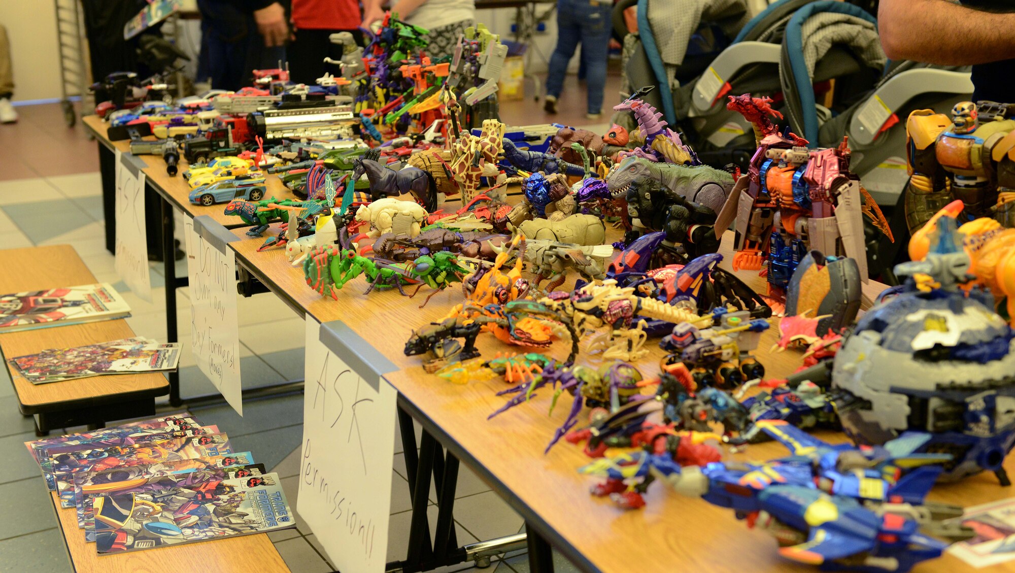 Action figures and comics are displayed during the first “AviCon,” Oct. 11, 2014, at Aviano Air Base, Italy. AviCon is a play-off of the original Comic Con International hosted in San Diego. (U.S. Air Force photo/Airman 1st Class Deana Heitzman)