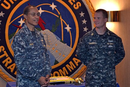 OFFUTT AIR FORCE BASE, Neb. (Oct. 14, 2014) Commander, U.S. Strategic Command (USSTRATCOM), Adm. Cecil D. Haney, left, speaks during the USSTRATCOM 239th Navy Birthday ceremony. Haney thanked the 257 active duty Sailors assigned to USSTRATCOM and recognized the contributions the U.S. Navy makes to its nine unique mission sets, including strategic deterrence, space operations and cyberspace operations. (U.S. Navy photo by Mass Communication Specialist 1st Class Byron C. Linder/Released)