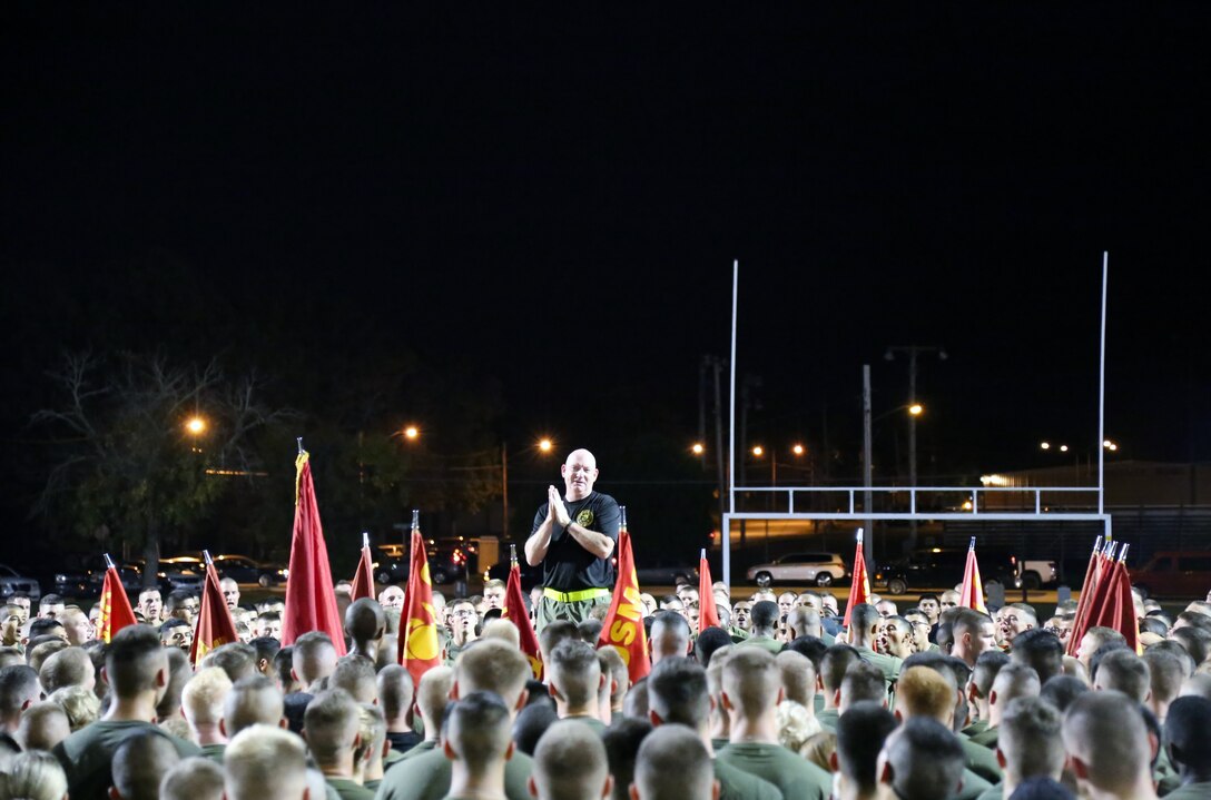 Commanding Officer, Marine Corps Detachment, Fort Leonard Wood, Missouri, Colonel Daniel E. Longwell talks to Marines after Detachment PT, Oct. 9, 2014.
