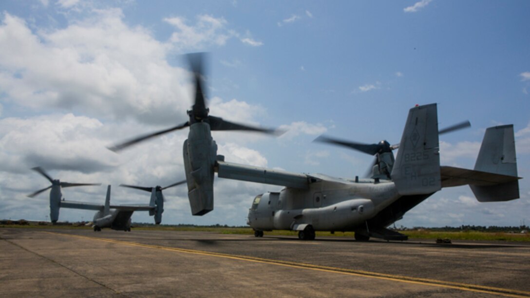 U.S. Marine Corps MV-22B Ospreys assigned to Special-Purpose Marine Air-Ground Task Force - Crisis Response - Africa prepare to take-off in support of Operation United Assistance in Monrovia, Liberia, Oct 11, 2014.  Operation United Assistance is part of a comprehensive U.S. Government effort, led by the U.S. Agency for International Development, to respond to and contain the outbreak of the Ebola virus in West Africa as quickly as possible. (U.S. Marine Corps photo by Lance Cpl. Andre Dakis/SP-MAGTF Crisis Response - Africa Combat Camera/Released)