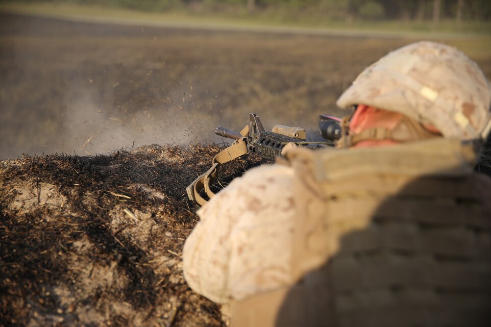 Marines with 3rd Battalion, 2nd Marine Regiment, fire on a mock enemy bunker and provide suppressive fire for an assault team during a live-fire exercise on Range P28 aboard Fort A.P. Hill, Va., Sept. 5. The range was built specifically for the unit as a training aid to increase overall unit readiness. (U.S. Marine Corps photo by Cpl. Jorden M. Wells / Released)