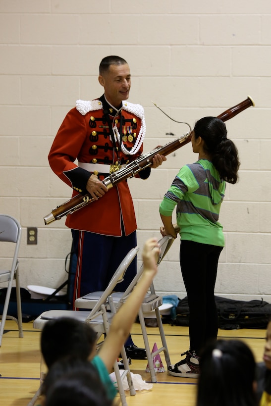 On Oct. 14, 2014, a woodwind quintet from "The President's Own" including flutist Staff Sgt. Kara Santos, oboe player Staff Sgt. Tessa Vinson, clarinet player Gunnery Sgt. Harry Ong, bassoon player Gunnery Sgt. Bernard Kolle, and French horn player Staff Sgt. Cecilia Kozlowski, performed a Music in the Schools program at Randolph Elementary School in Arlington, Va. (U.S. Marine Corps photo by Master Sgt. Kristin duBois/released)