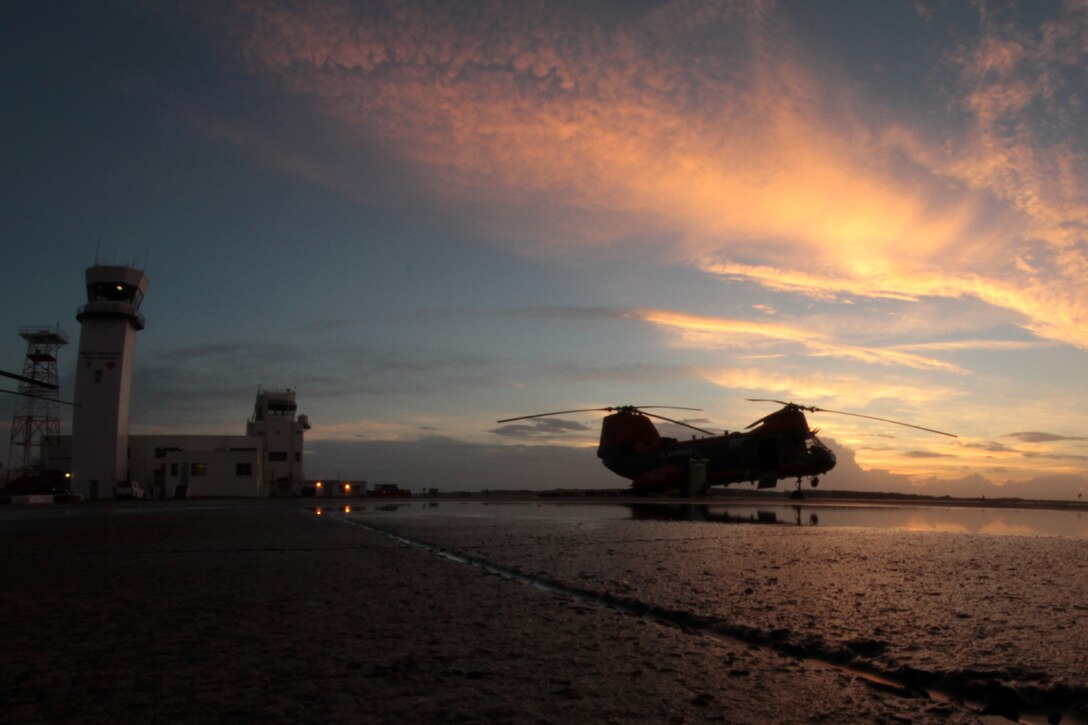 An HH-46E Sea Knight helicopter belonging to Marine Transport Squadron 1 sits on the Marine Corps Air Station Cherry Point, N.C., flight line as the sun rises Oct. 14, 2014. 
The Marines of VMR-1 specialize in land and sea search and rescue and transport of military personnel. VMR-1 is the only squadron in the Marine Corps whose primary mission is SAR and is the last remaining Marine Corps squadron to fly the Sea Knight.  
