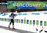 Army World Class Athlete Program biathlete Sgt. Jeremy Teela of the Utah National Guard nears the finish line for ninth place with a time of 25 minutes, 21.7 seconds in the Olympic men's 10-kilometer sprint race Feb. 14, 2010, at Whistler Olympic Park in Callaghan Valley, British Columbia, Canada. It was the best American finish ever on Olympic biathlon competition.