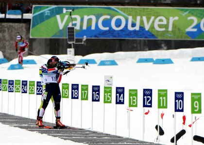 Army World Class Athlete Program biathlete Sgt. Jeremy Teela of the Utah National Guard nears the finish line for ninth place with a time of 25 minutes, 21.7 seconds in the Olympic men's 10-kilometer sprint race Feb. 14, 2010, at Whistler Olympic Park in Callaghan Valley, British Columbia, Canada. It was the best American finish ever on Olympic biathlon competition.