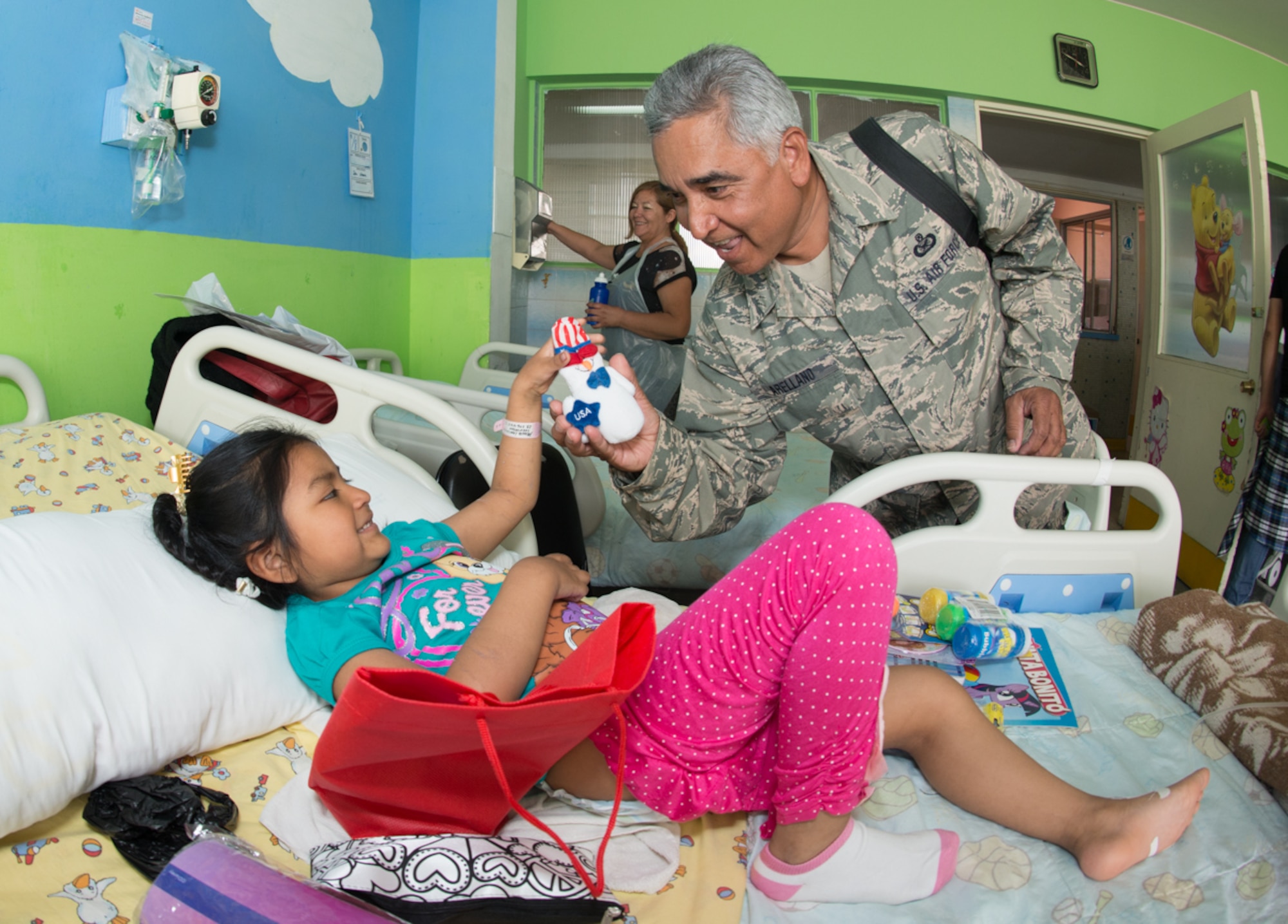 Members from the 149th Fighter Wing of the Texas Air National Guard, along with the other countries participating in Salitre 2014, visit the children’s ward at the Leonardo Guzman Regional Hospital,Oct. 11, 2014, in Antofagasta, Chile, to distribute gifts and bring a few moments of joy to the hospitalized children. Salitre is a Chilean-led exercise where the U.S., Chile, Brazil, Argentina and Uruguay, focus on increasing interoperability between allied nations. (Air National Guard photo/Senior Master Sgt. Elizabeth Gilbert)
