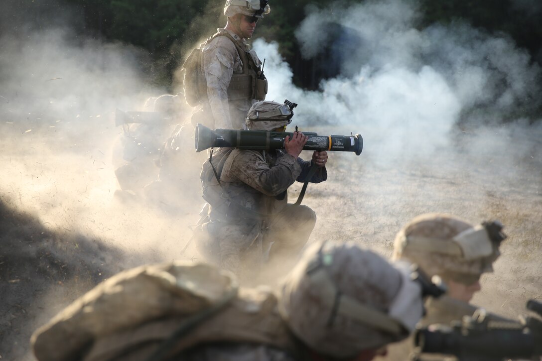Two Marines with 3rd Battalion, 2nd Marine Regiment, fire an AT4-Rocket Launcher at a target during a live-fire training exercise on Range P28 aboard Fort A.P. Hill, Va., Sept. 5. The range was built specifically for the unit as a training aid to increase overall unit readiness. 