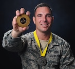Staff Sgt. Christopher D'Angelo, 819th RED HORSE Squadron heavy equipment operator, recently returned from London and Colorado Springs, Colorado, after competing in the 2014 Invictus Games and the 2014 Warrior Games. D’Angelo and his teammates brought the U.S. home a silver medal in wheelchair rugby. D’Angelo also placed second in rowing for the four-minute race and third in the one-minute sprint. (U.S. Air Force photo/Beau Wade)