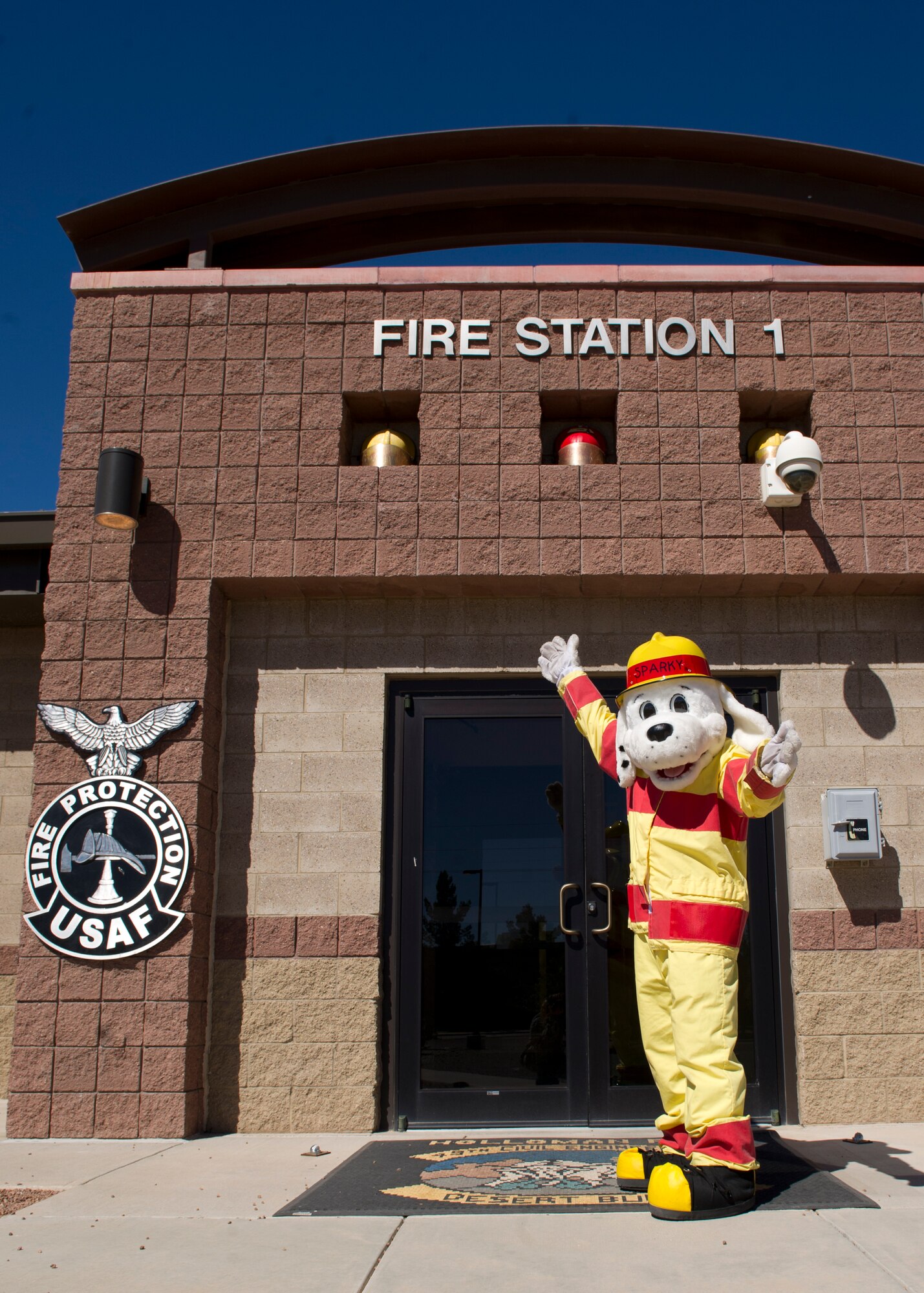 Sparky the Fire Dog invites members of Team Holloman to join the festivities during Fire Prevention Week at Holloman Air Force Base, N.M. Oct. 5. Fire Prevention Week was proclaimed to happen from Oct. 5 until Oct. 11. The reason for this awareness week started in 1922 as a dedication and remembrance to those who lost their lives and property to the Great Chicago Fire of 1871. (U.S. Air Force photo by Staff Sgt. E’Lysia Wray/Released)