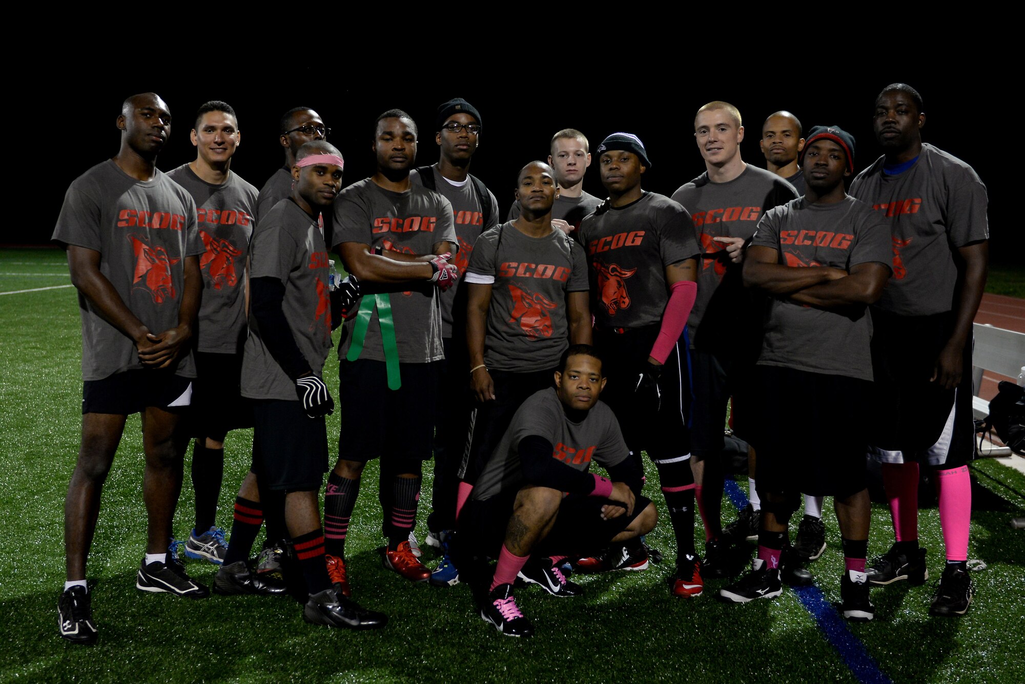 For five years the 635th Supply Chain Operations Group has worn pink during flag football games at Scott Air Force Base, Ill. They decided to wear pink in support of October being Breast Cancer Awareness month. The SCOG played on Oct. 8, 2014 and took home a 26-0 win over the 375th Operations Support Squadron’s football team. (U.S. Air Force photo/ Airman 1st Class Kiana Brothers)