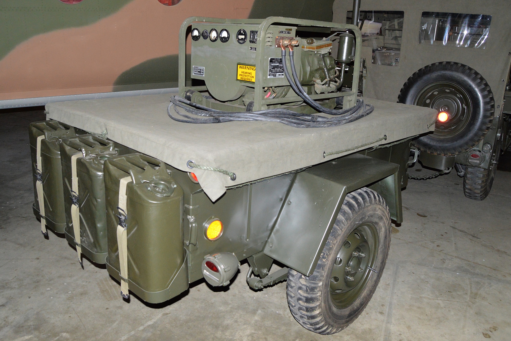 DAYTON, Ohio -- Generator and trailer for the AN/MRC-108 Communication System on display in the Southeast Asia War Gallery at the National Museum of the U.S. Air Force. (U.S. Air Force photo) 
