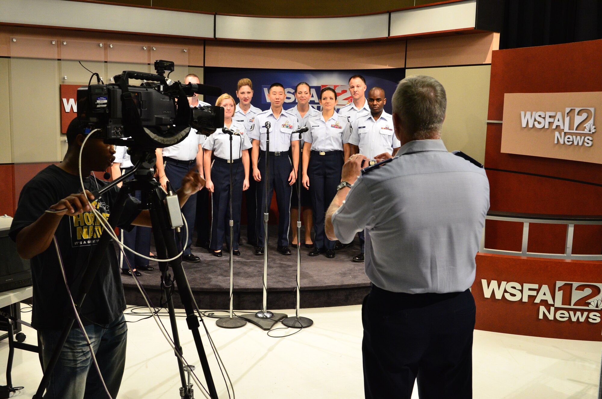 Col Lang conducts members of the Singing Sergeants performing "Freedom Song" arranged by Singing Sergeants member Master Sgt. Ben Park. (U.S. Air Force photo by Senior Master Sgt. Bob Kamholz/released)
