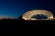 Airmen begin to gather before sunrise in Florida at Avon Park Air Force Range’s only hangar Oct. 9, 2014. The hangar served as a staging point for Airmen, cargo and operations centers during a deployment exercise from Moody Air Force Base, Ga. (U.S. Air Force Photo by Airman 1st Class Ryan Callaghan/Released)
