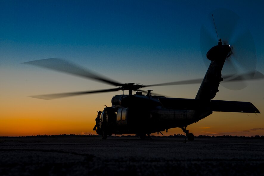 An HH-60G Pave Hawk from the 41st Rescue Squadron sits ready to take off Oct. 9, 2014, at Avon Park Air Force Range, Fla. The 41st RQS deployed three HH-60Gs to Avon Park as part of a Wing Readiness Inspection. (U.S. Air Force Photo by Airman 1st Class Ryan Callaghan/Released)