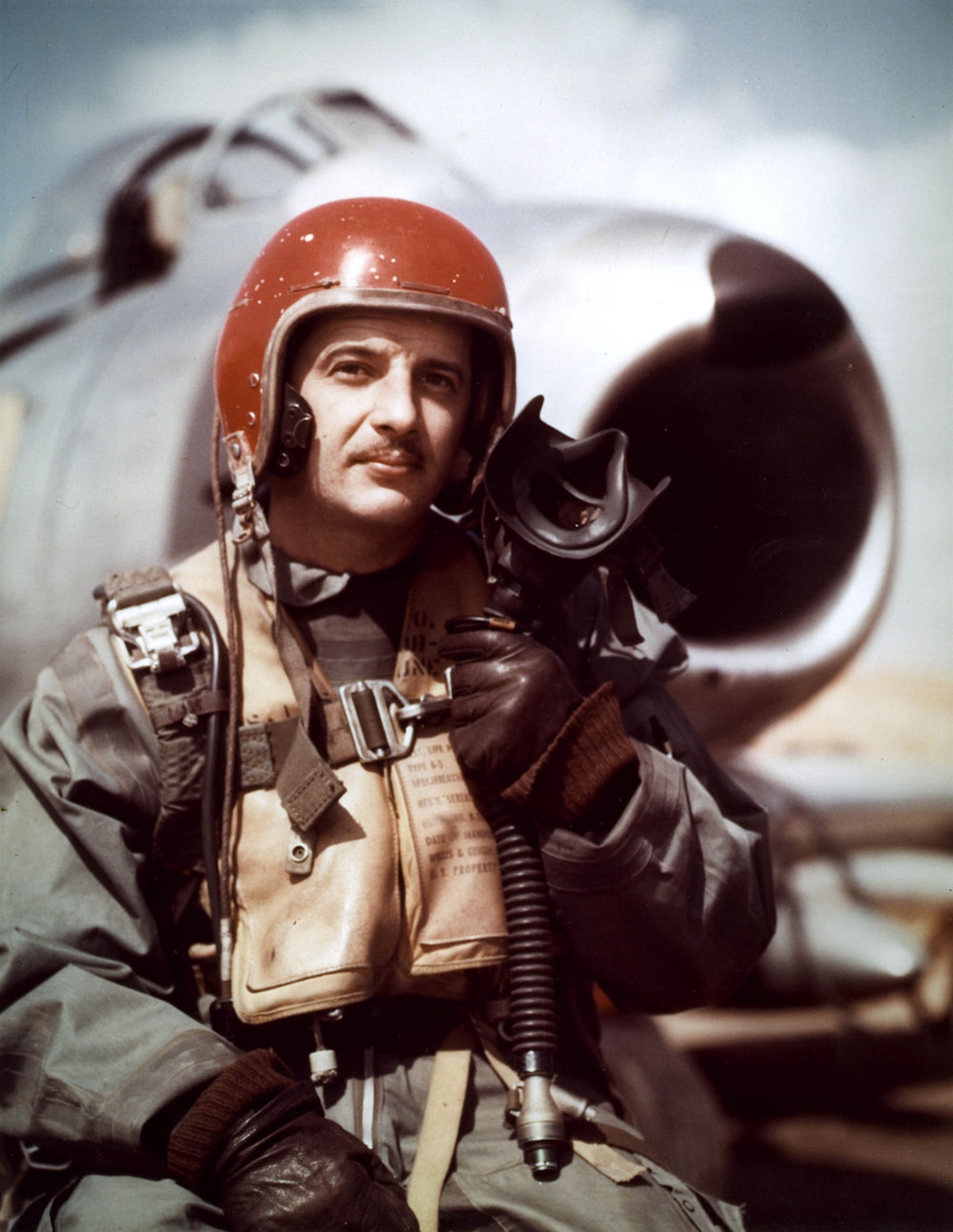 Capt. Manuel Fernandez, 334th Fighter Interceptor Squadron F-86 Sabre pilot, Kimpo Air Base, Republic of Korea, poses with his aircraft during the Korean War. Fernandez was the third highest ranking American flying ace of the Korean War with 14.5 confirmed kills. (Courtesy photo)