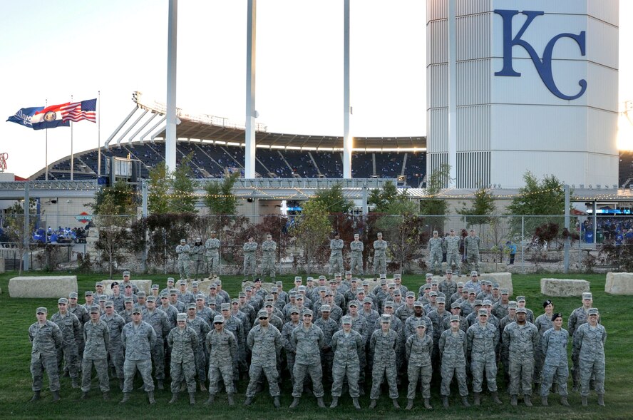 Airmen from the 442d Fighter Wing join their counterparts from the Army and active duty Air Force out of Whiteman Air Force Base to volunteer for the flag detail at Royals stadium October 14, 2014 for the third game of the American League Central Series. The Royals beat the Orioles two to one. More than 100 members from Whiteman AFB, many Kansas City natives, volunteered to participate in the Royals’ most successful season in 30 years. (Air Force photo by Tech. Sgt. Emily F. Alley)