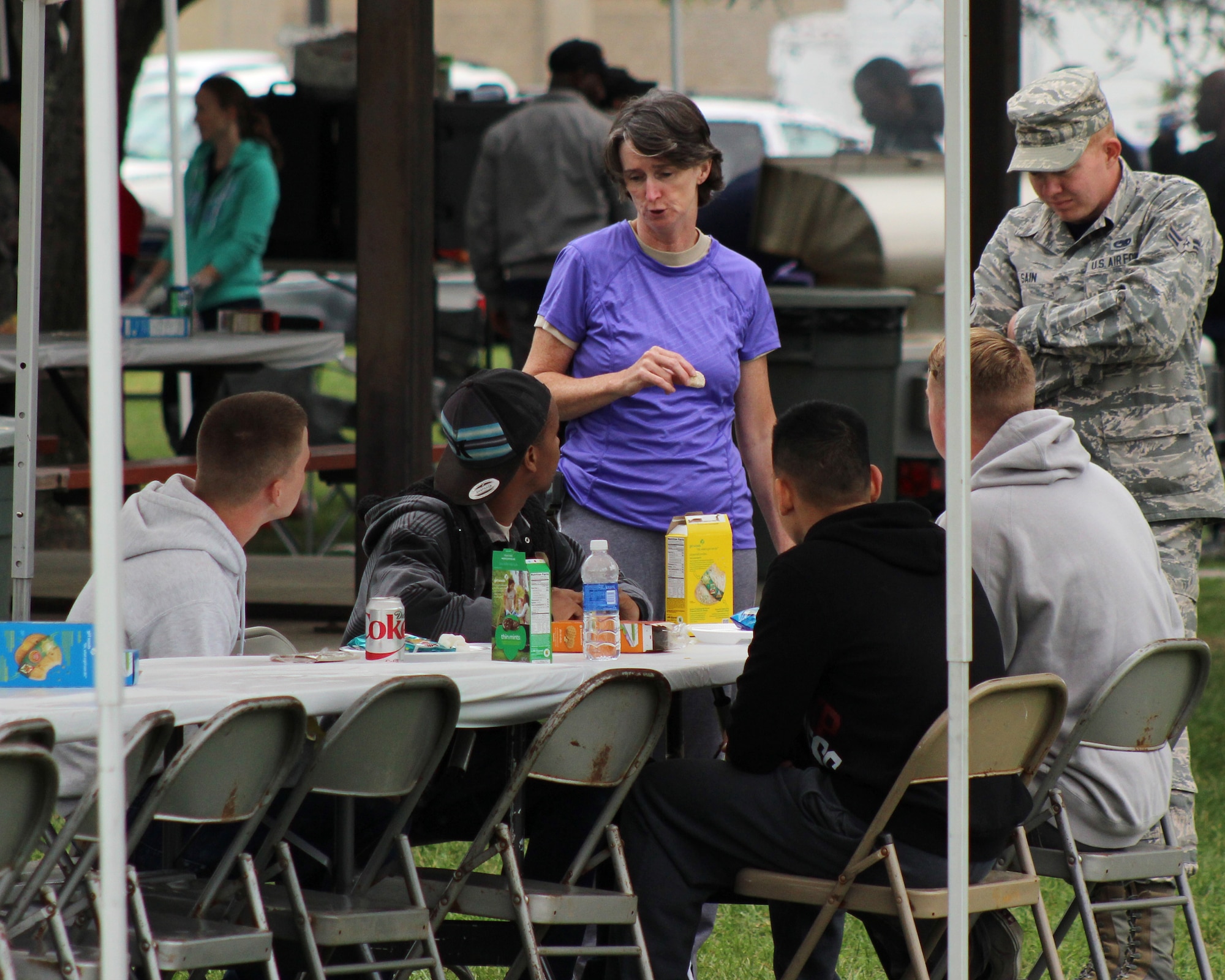 Col. Lisa Pike, 436th Mission Support Group commander, speaks to Airmen during the Airmen Appreciation Barbeque Oct. 10, 2014, at Dover Air Force Base, Del. Free food was provided to all Team Dover Airmen, E-4 and below, that attended the event. (U.S. Air Force photo/Herbert E. Welday III)
