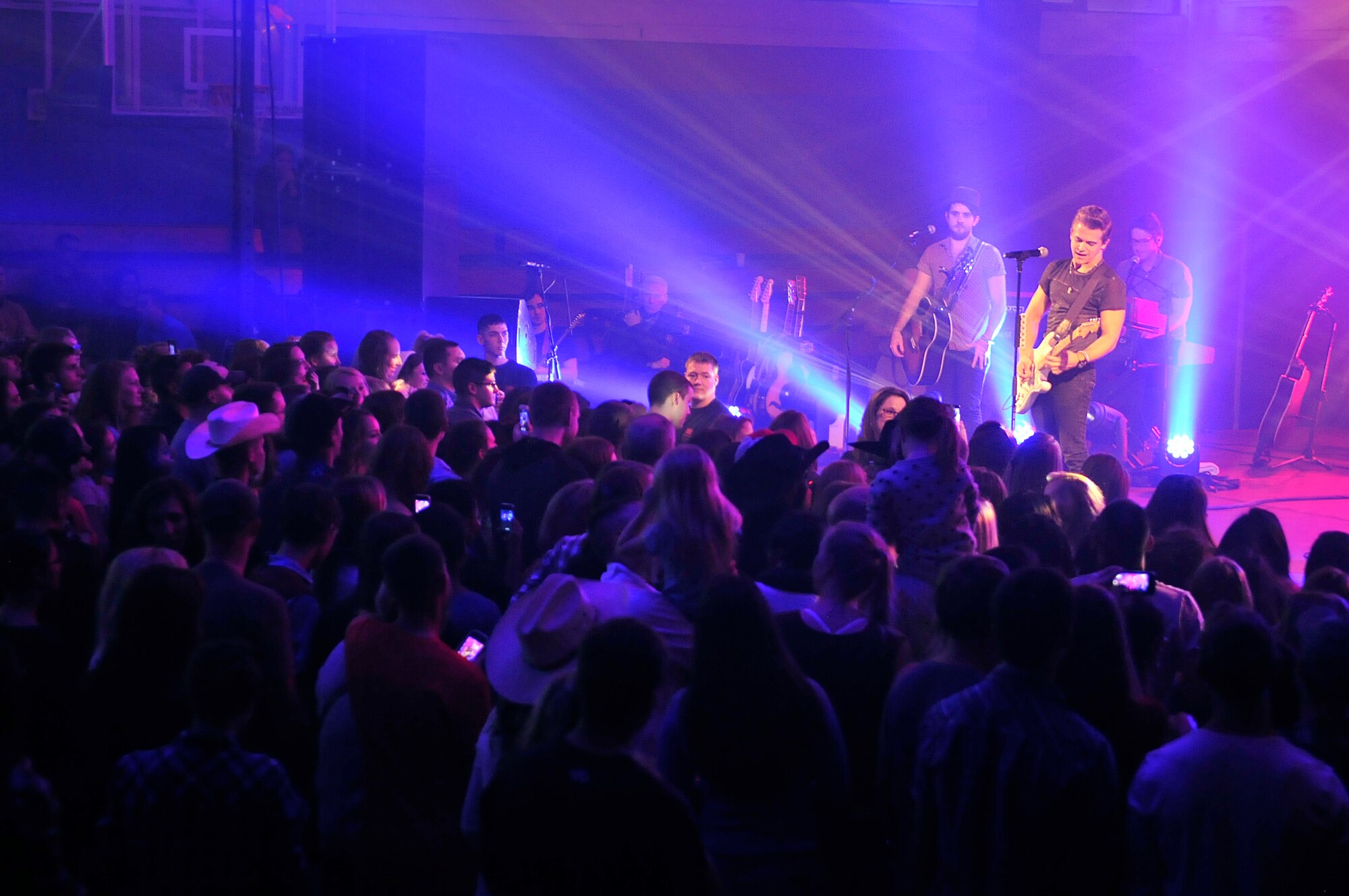 Hunter Hayes, a country music singer, performs for Team Mildenhall and RAF Lakenheath members as part of a United Services Organization concert Oct. 11, 2014, on RAF Mildenhall, England. This was Hayes’ first USO concert. (U.S. Air Force photo/Senior Airman Christine Griffiths/Released)