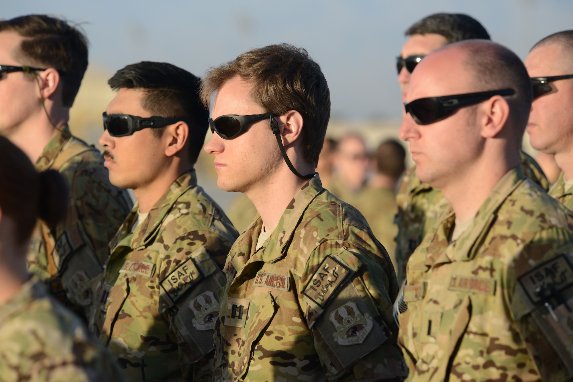 U.S. Airmen and Soldiers assigned to 4th Expeditionary Reconnaissance Squadron stand in formation prior to being re-designated Joint Task Force Thor during the transition of authority ceremony at Bagram Airfield, Afghanistan Oct. 1, 2014. (U.S. Air Force photo by Master Sgt. Cohen A. Young/Released)