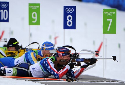 U.S. Army World Class Athlete Program biathlete Sgt. Jeremy Teela shoots to a ninth-place finish in the Olympic men's 10-kilometer sprint at Whistler Olympic Park in British Columbia, Feb. 14, 2010.