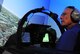 Retired Lt. Col. Robert Pardo surveys the surrounding area while in the F-15E Strike Eagle simulator at Seymour Johnson Air Force Base, N.C., Oct. 14, 2014. Pardo toured the base during his visit and spoke to the graduating pilots and weapons systems operators of the F-15E Basic Course. (U.S. Air Force photo/Airman 1st Class Ashley J. Thum)