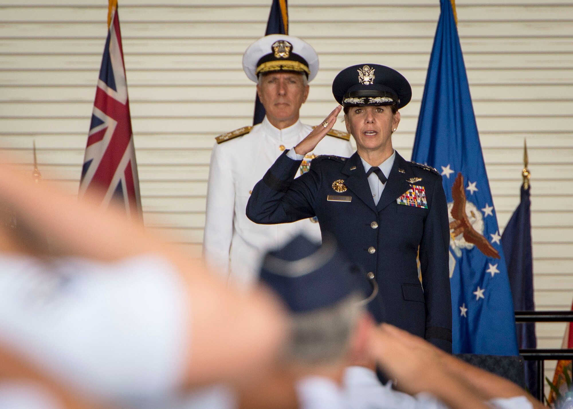Gen. Lori Robinson, Pacific Air Forces commander, returns her first salute from Airmen during the PACAF change of command ceremony at Joint Base Pearl Harbor-Hickam, Hawaii, Oct. 16, 2014. Robinson now leads the U.S. Air Force’s Indo-Asia-Pacific Region command, serving an area of responsibility that covers more than 100 million square miles and extends from the west coast of the United States to the east coast of Africa and from the Arctic to the Antarctic. (U.S. Air Force photo by Capt. Raymond Geoffroy/Released)