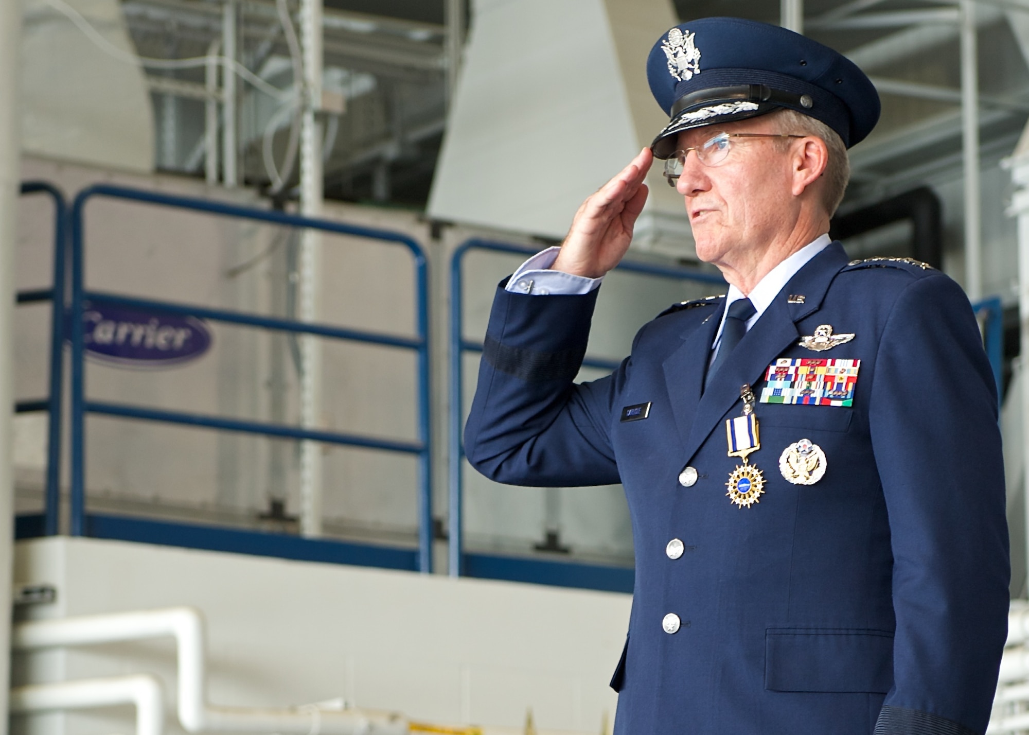 Gen. Hawk Carlisle, outgoing Pacific Air Forces commander, returns his final salute from Airmen during the PACAF change of command ceremony at Joint Base Pearl Harbor-Hickam, Hawaii, Oct. 16, 2014. Carlisle led Airmen spread across half the globe, serving principally in Japan, Korea, Hawaii, Alaska and Guam. (U.S. Air Force photo by Tech. Sgt. James Stewart/Released)