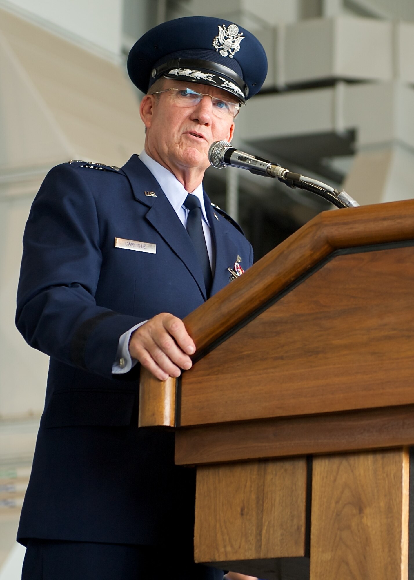 Gen. Hawk Carlisle, outgoing Pacific Air Forces commander, addresses Airmen during the PACAF change of command ceremony at Joint Base Pearl Harbor-Hickam, Hawaii, Oct. 16, 2014. Carlisle led Airmen spread across half the globe, serving principally in Japan, Korea, Hawaii, Alaska and Guam. (U.S. Air Force photo by Tech. Sgt. James Stewart/Released)