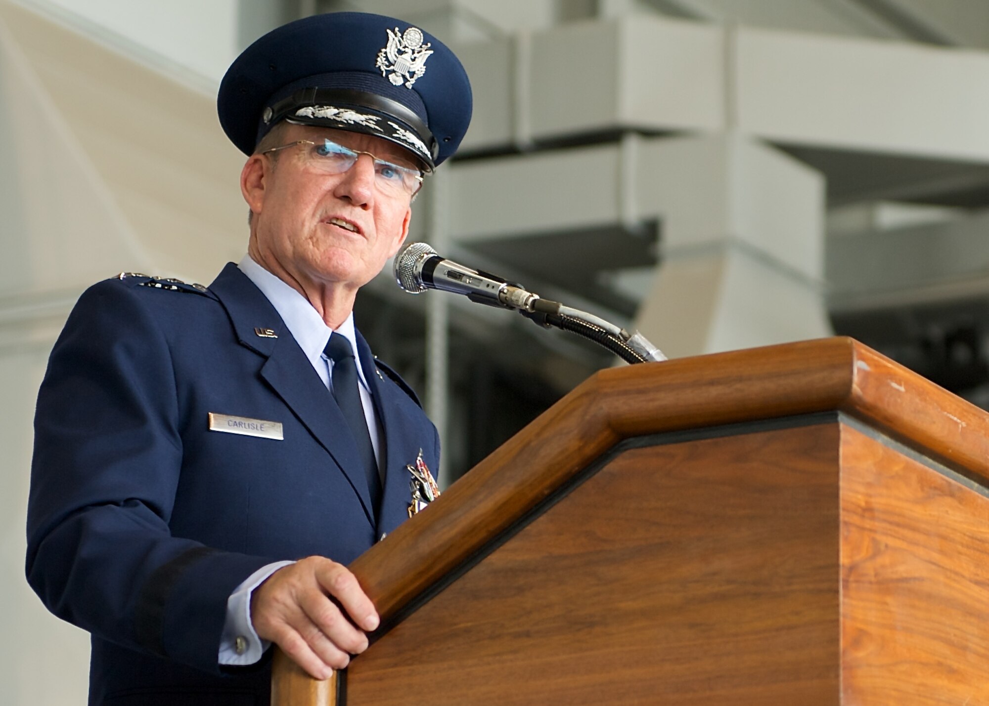 Gen. Hawk Carlisle, outgoing Pacific Air Forces commander, addresses Airmen during the PACAF change of command ceremony at Joint Base Pearl Harbor-Hickam, Hawaii, Oct. 16, 2014. Carlisle led Airmen spread across half the globe, serving principally in Japan, Korea, Hawaii, Alaska and Guam. (U.S. Air Force photo by Tech. Sgt. James Stewart/Released)