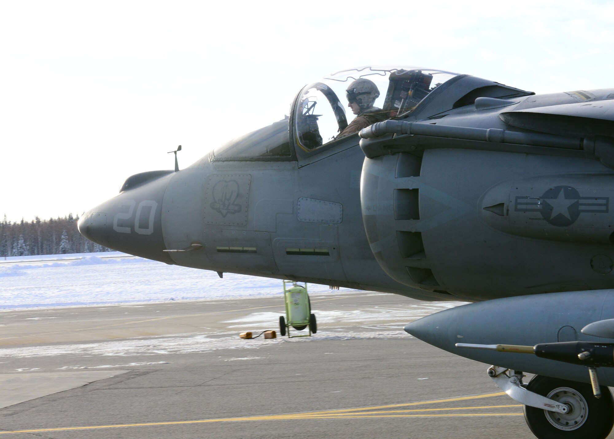 U.S. Marine Corps Capt. Benjamin Boera, a Marine Attack Squadron 311 AV-8B Harrier ground attack aircraft pilot, assigned to Marine Corps Air Station Yuma, Ariz., taxis down the runway Oct 8, 2014, during RED FLAG-Alaska 15-1 at Eielson Air Force Base, Alaska. RF-A is a series of Pacific Air Forces commander-directed field training exercises for U.S. and partner nation forces, providing combined offensive counter-air, interdiction, close air support and large force employment training in a simulated combat environment. (U.S. Air Force photo by Senior Airman Ashley Nicole Taylor/Released)
