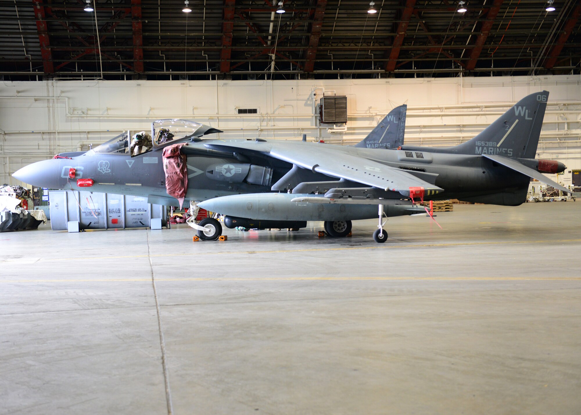 A U.S. Marine Corps AV-8B Harrier ground attack aircraft assigned to Marine Attack Squadron 311, Marine Corps Air Station Yuma, Ariz., waits in a hangar for routine maintenance Oct. 3, 2014, during RED FLAG-Alaska 15-1 at Eielson Air Force Base, Alaska. RF-A is a series of Pacific Air Forces commander-directed field training exercises for U.S. and partner nation forces, providing combined offensive counter-air, interdiction, close air support and large force employment training in a simulated combat environment. (U.S. Air Force photo by Senior Airman Ashley Nicole Taylor/Released)