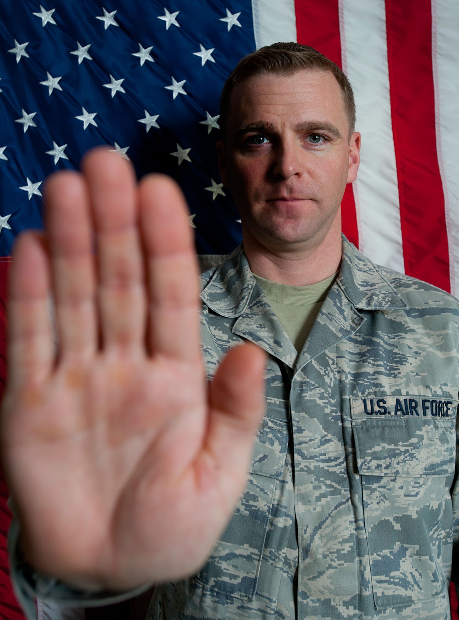 Master Sgt. Brian Neild received the Green Dot Bystander award for acting to stop a scene of domestic violence that happened in downtown Anchorage in August 2013. Neild is a personnel systems manager serving in the 176th Force Support Flight, Alaska Air National Guard. (U.S. Air Force photo/Staff Sgt. Robert Barnett)