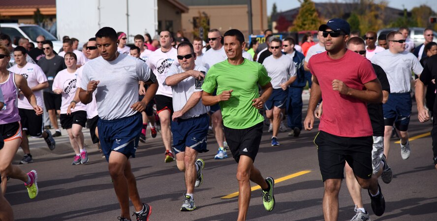 Participants begin the 2nd Annual Breast Cancer Awareness Month 5K walk/run at Malmstrom Air Force Base, Mont., Oct. 15. Each year it is estimated that over 220,000 women in the United States will be diagnosed with breast cancer and over 40,000 will die. Although breast cancer in men is uncommon, an estimated 2,150 men will be diagnosed with breast cancer and approximately 410 will die each year, according to the National Breast Cancer Awareness Foundation. (U.S. Air Force photo/ Airman 1st Class Joshua Smoot)