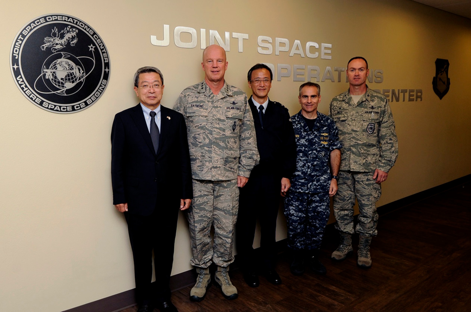 Gen. (Ret) Dr. Haruhiko Kataoka, Advisor, Japanese National Security Secretariat and former Chief of Staff, Japan Air Self-Defense Force, Lt. Gen. Jay Raymond, Commander, 14th Air Force (Air Forces Strategic) and Joint Functional Component Command for Space, Maj. Gen. Jun Nagashima, Deputy Assistant Chief Cabinet Secretary, National Security Secretariat, Rear Adm. Brian Brown, Deputy Commander, Joint Functional Component Command for Space and Col. John Giles, Commander, 614th Air and Space Operations Center and Director, Joint Space Operations Center, visit the JSpOC, Oct. 13, 2014, Vandenberg Air Force Base, Calif. The JSpOC is a synergistic command and control system which provides a focal point for the operational employment of worldwide joint space forces. (U.S. Air Force photo by Senior Airman Shane Phipps/Released)