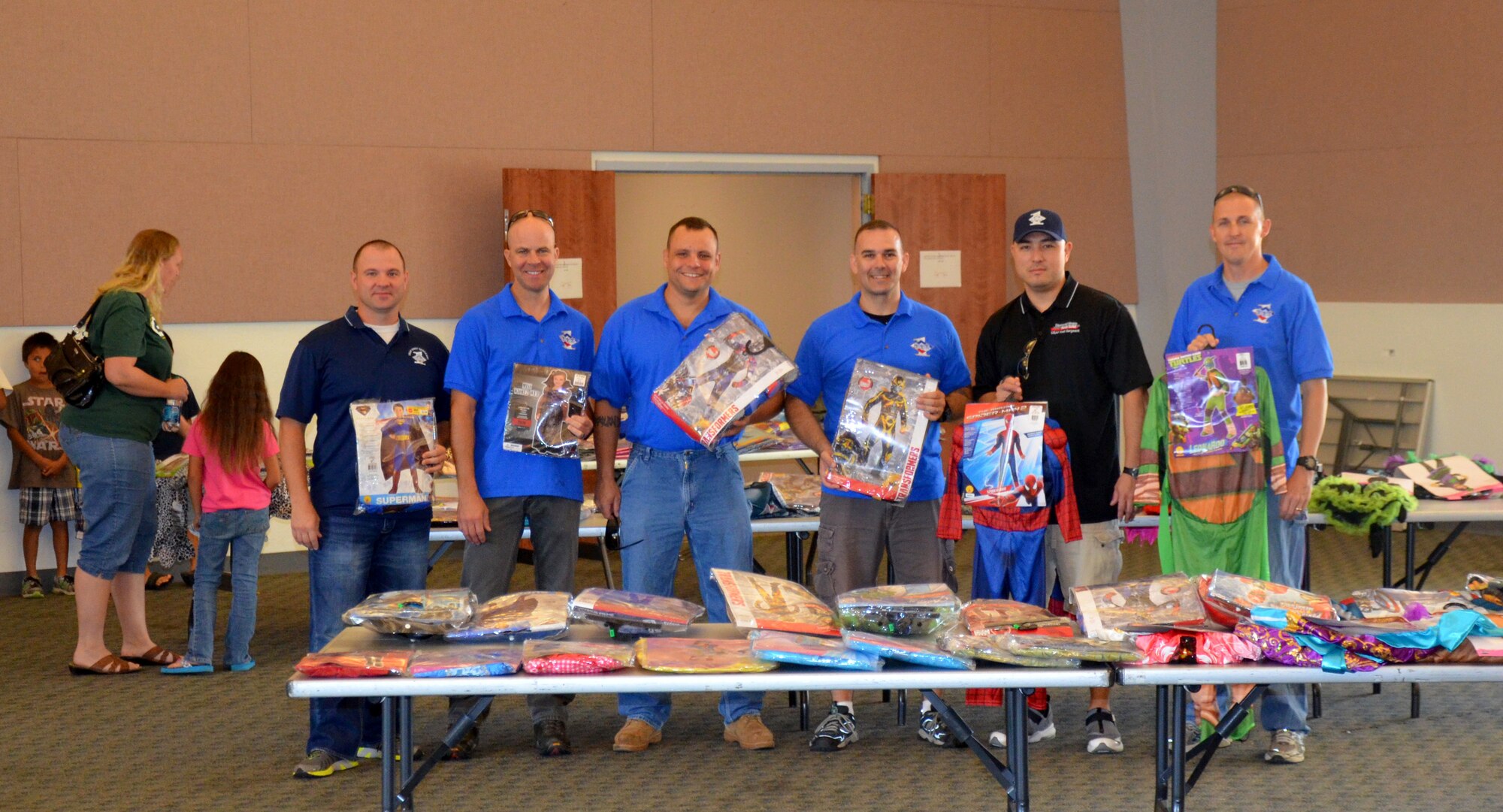 Members of Beale’s First Sergeant Council pose for a photo during a Halloween costume donation at the Community Activity Center on Beale Air Base, Calif., Oct. 11, 2014. The council donated nearly 150 costumes. (U.S. Air Force photo by Airman 1st Class Logan Lasko/Released)  